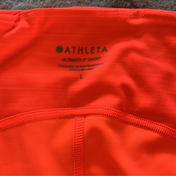 Like new! Athleta Ultimate 3” shorts bright orange size large - Picture 5 of 5